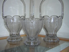 #459 Round Colonial Basket, crystal, left to right #351 Anne Satin, #353 Susan Satin, #352 Mums Satin etch, 1915-1933